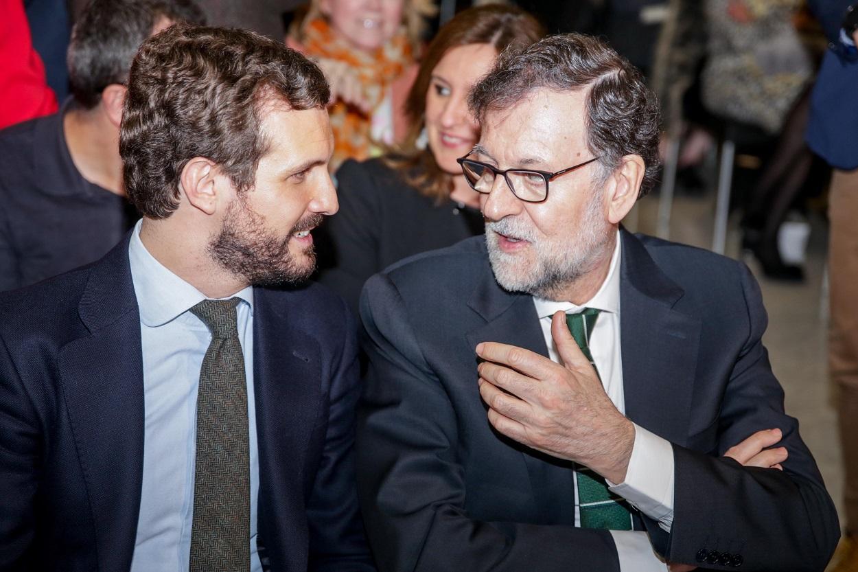El presidente del Partido Popular, Pablo Casado; y el expresidente del Gobierno, Mariano Rajoy