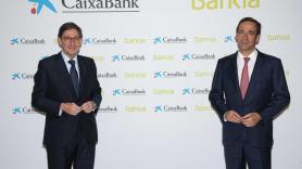 José Ignacio Goirigolzarri y Gonzalo Gortázar, presidente y consejero delegado de la nueva CaixaBank en la presentación oficial de la fusión entre CaixaBank y Bankia
