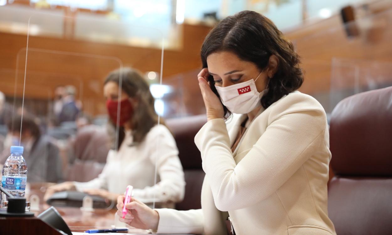 La presidenta de la Comunidad de Madrid, Isabel Díaz Ayuso, durante una sesión plenaria en la Asamblea de Madrid