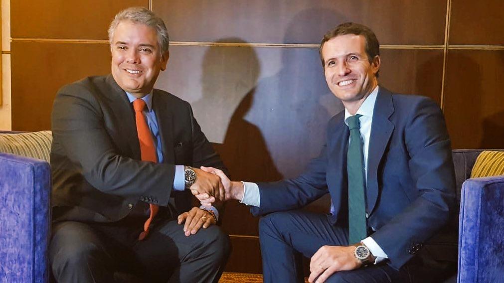 El líder del Partido Popular, Pablo Casado con Iván Duque, presidente de Colombia.