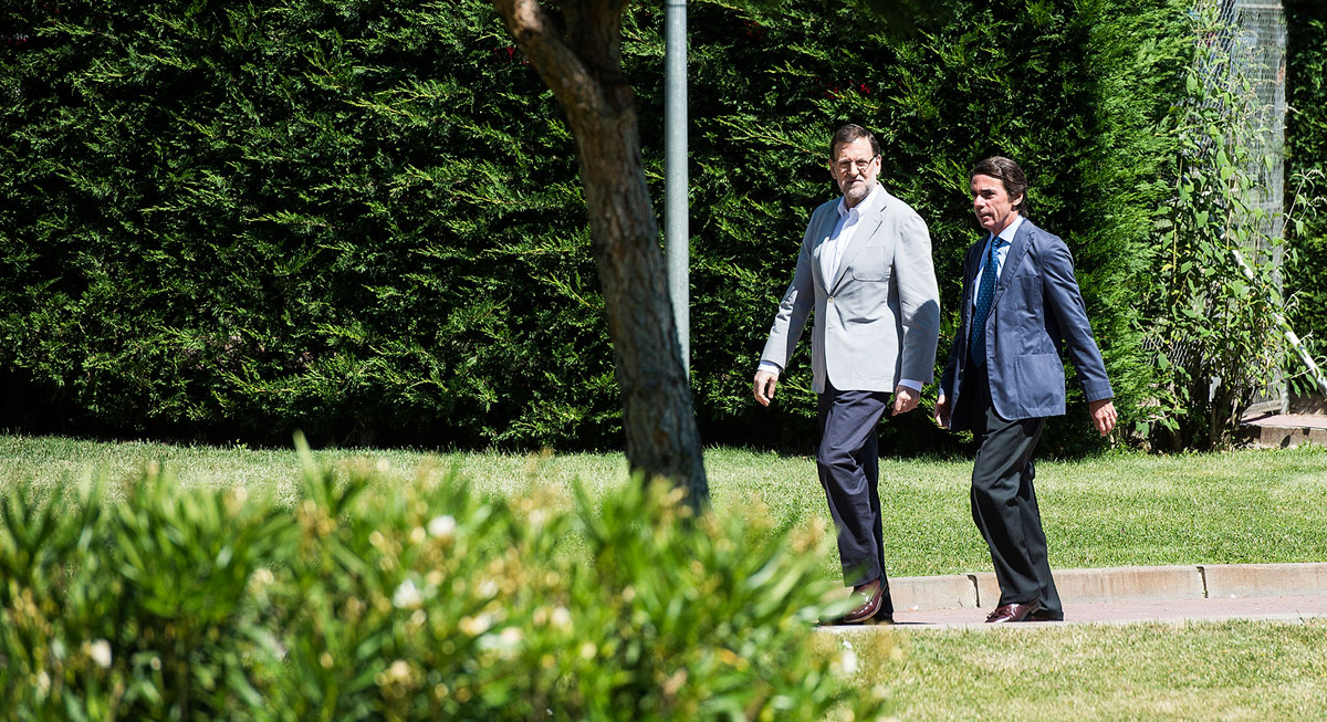 Mariano Rajoy junto al expresidente José María Aznar