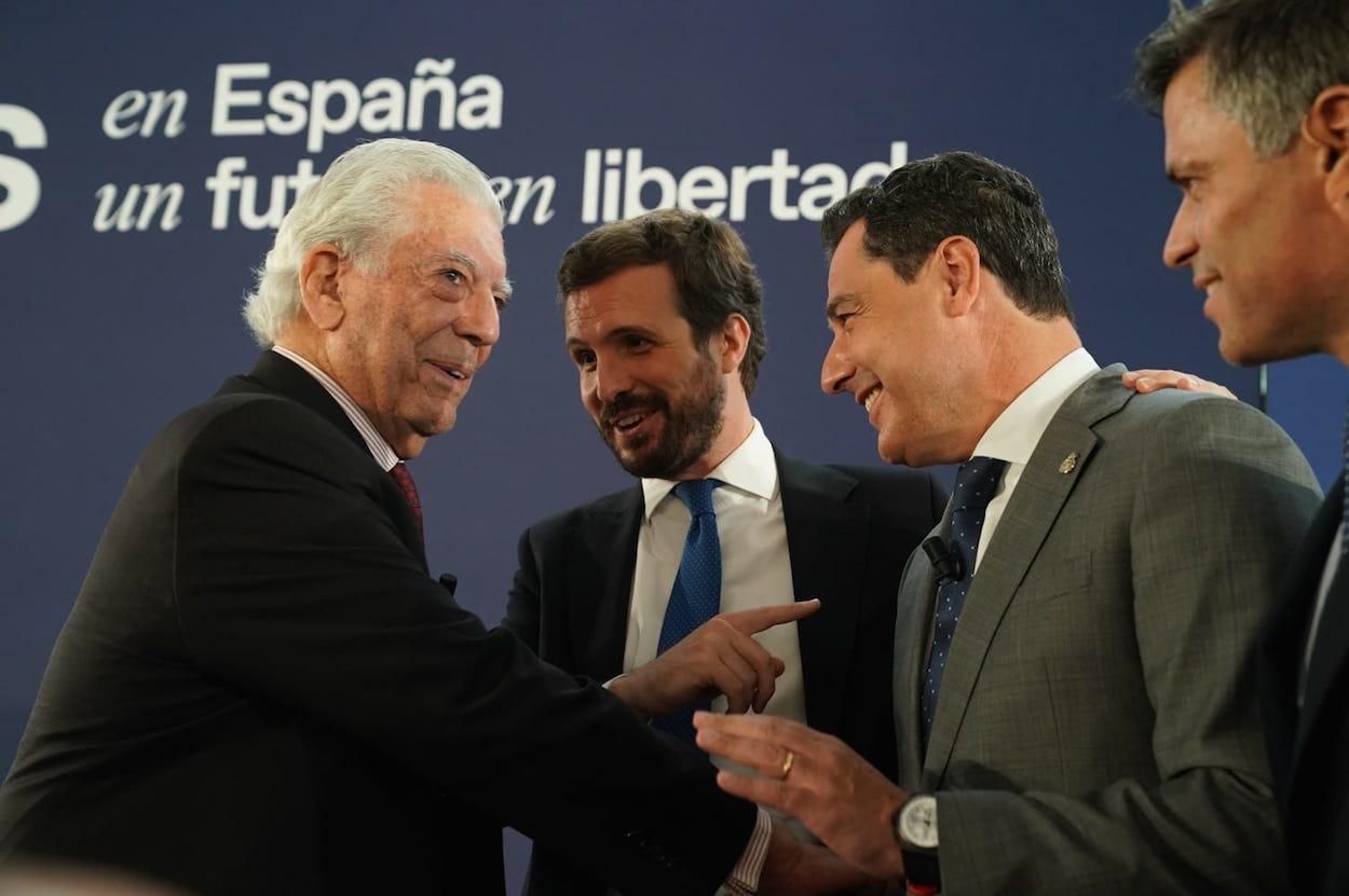 Mario Vargas Llosa, Pablo Casado, Juan Manuel Moreno y Leopoldo López, ayer en Sevilla. PP