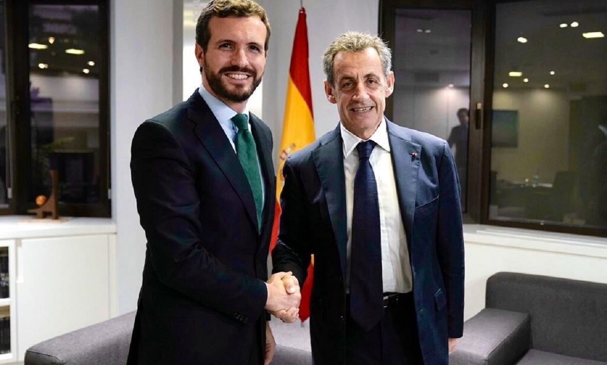 El líder del PP, Pablo Casado, y el expresidente francés Nicolas Sarkozy. EP