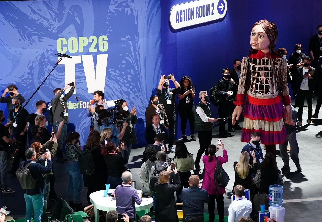 Un muñeco en la COP26. Jane Barlow / Europa Press