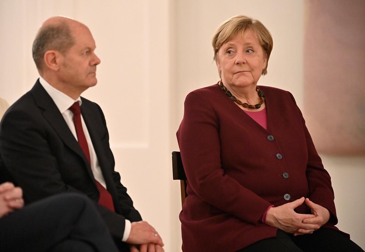 Olaf Scholz y Angela Merkel, juntos, en una imagen de archivo. Fuente: Europa Press.