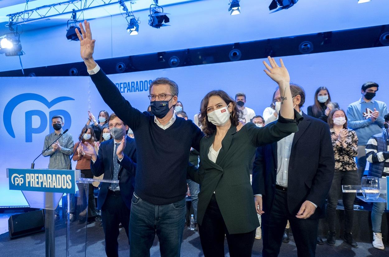 Ayuso y Feijóo, durante el acto en Madrid del dirigente gallego para presentar su programa de cara al congreso nacional. EP