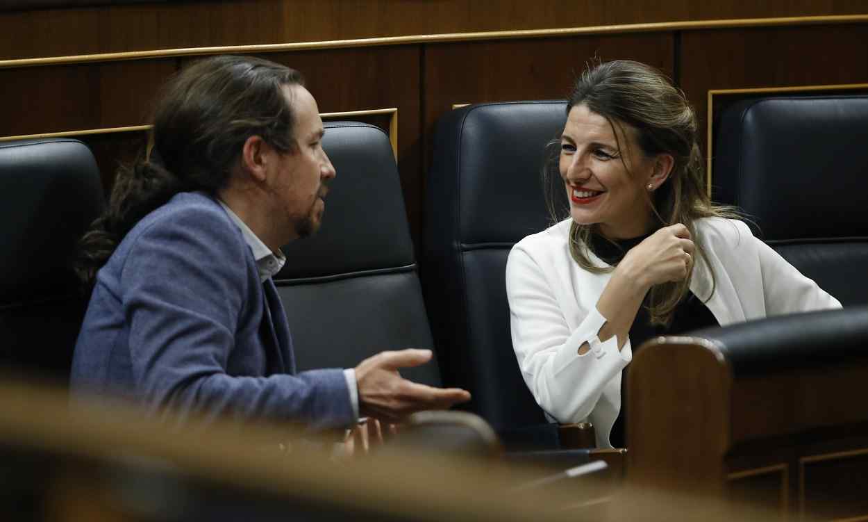 La ministra de Trabajo, Yolanda Díaz, y el exlíder de Podemos, Pablo Iglesias. EP
