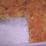 Empanada de maíz con xoubas y ensalada