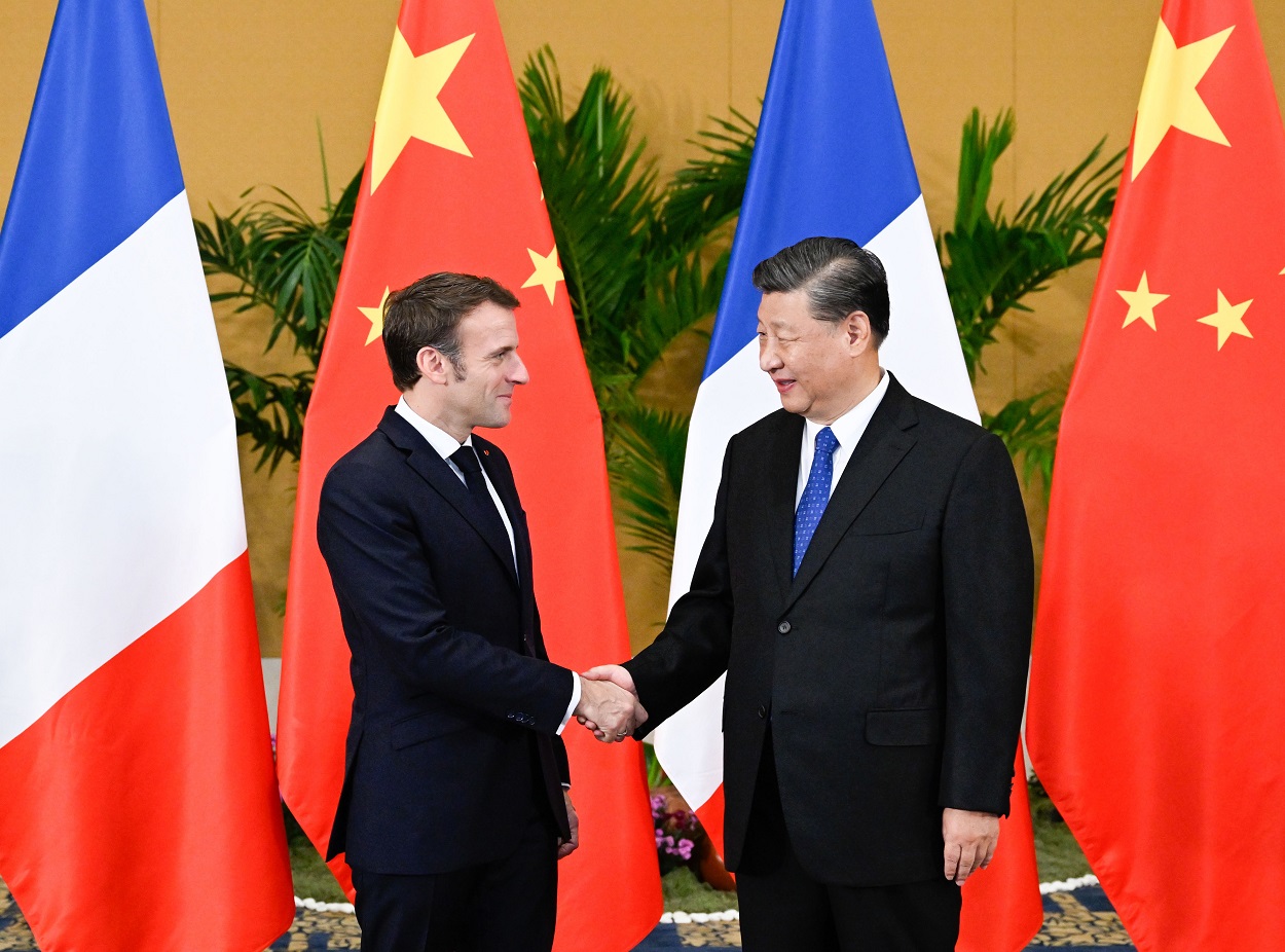 Emmanuel Macron y Xi Jinmping, en la reunión que ambos han mantenido este jueves en Pekín. EP.
