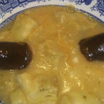 Alcachofas con patatas y morcilla y falda de ternera