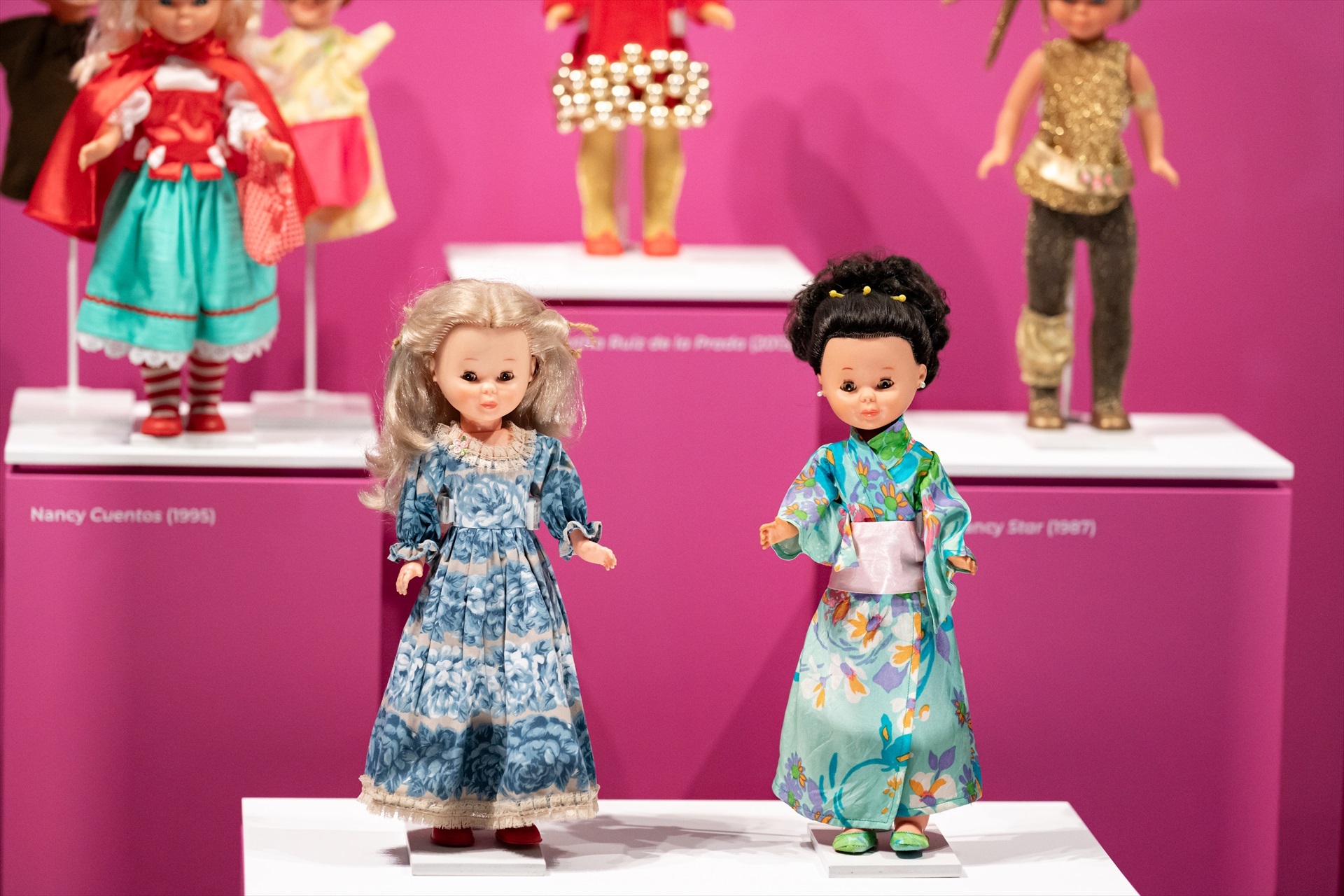 Muñecas Nancy en una exposición, en el Museo del Traje, a 1 de diciembre de 2023, en Madrid (España). El Museo del Traje, Centro de Investigación del Patrimonio Etnológico, dedica una exposición temporal en sus instalaciones a la muñeca Nancy con motivo del 55 aniversario del juguete. 