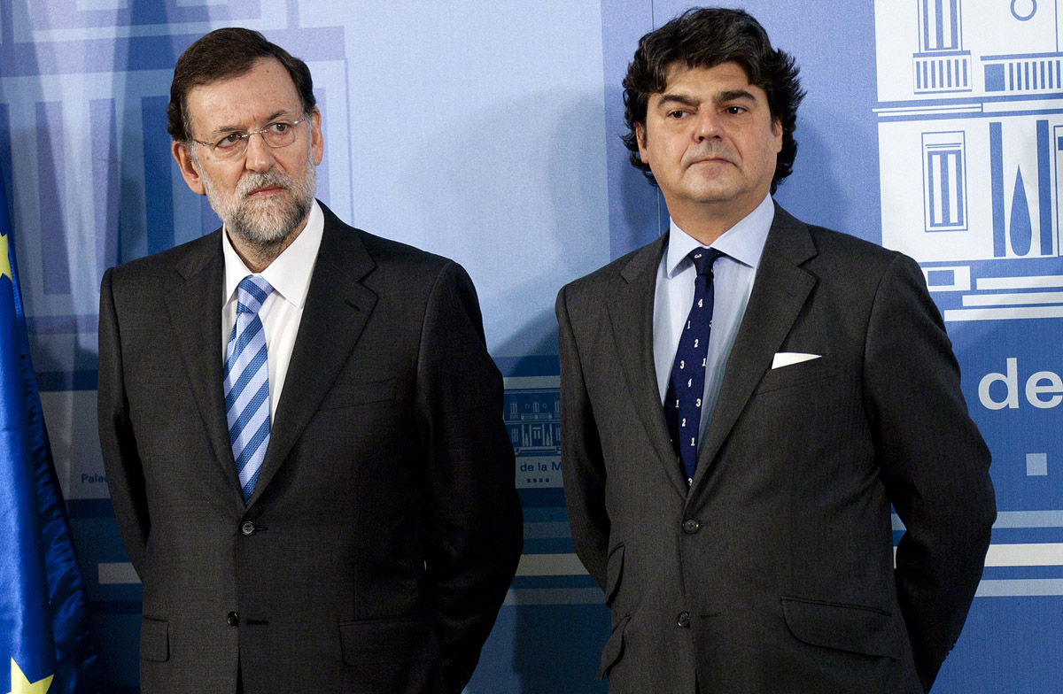 Mariano Rajoy (izq.) y su jefe de campaña, Jorge Moragas (der.)