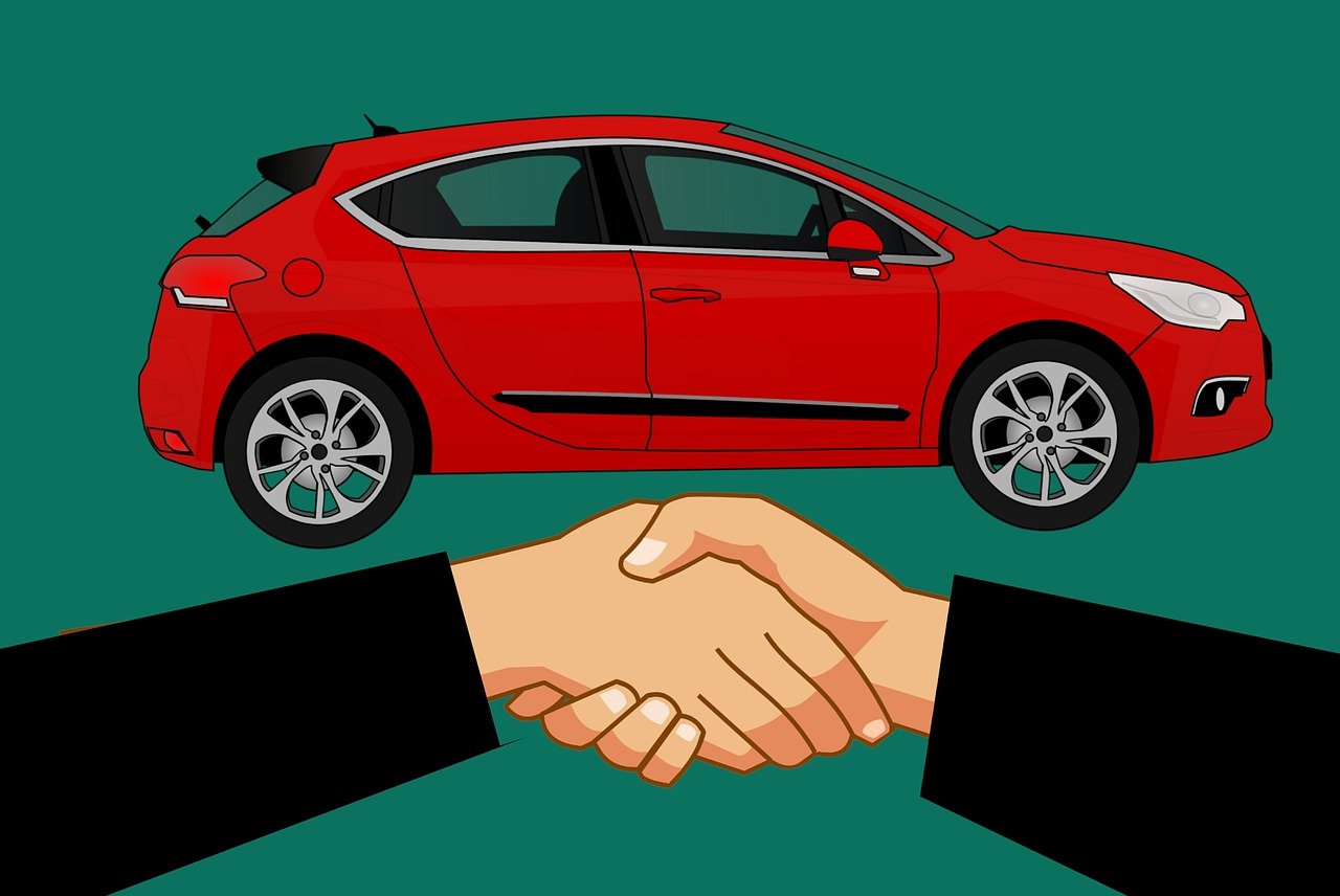 Choque de manos y coche / PIXABAY
