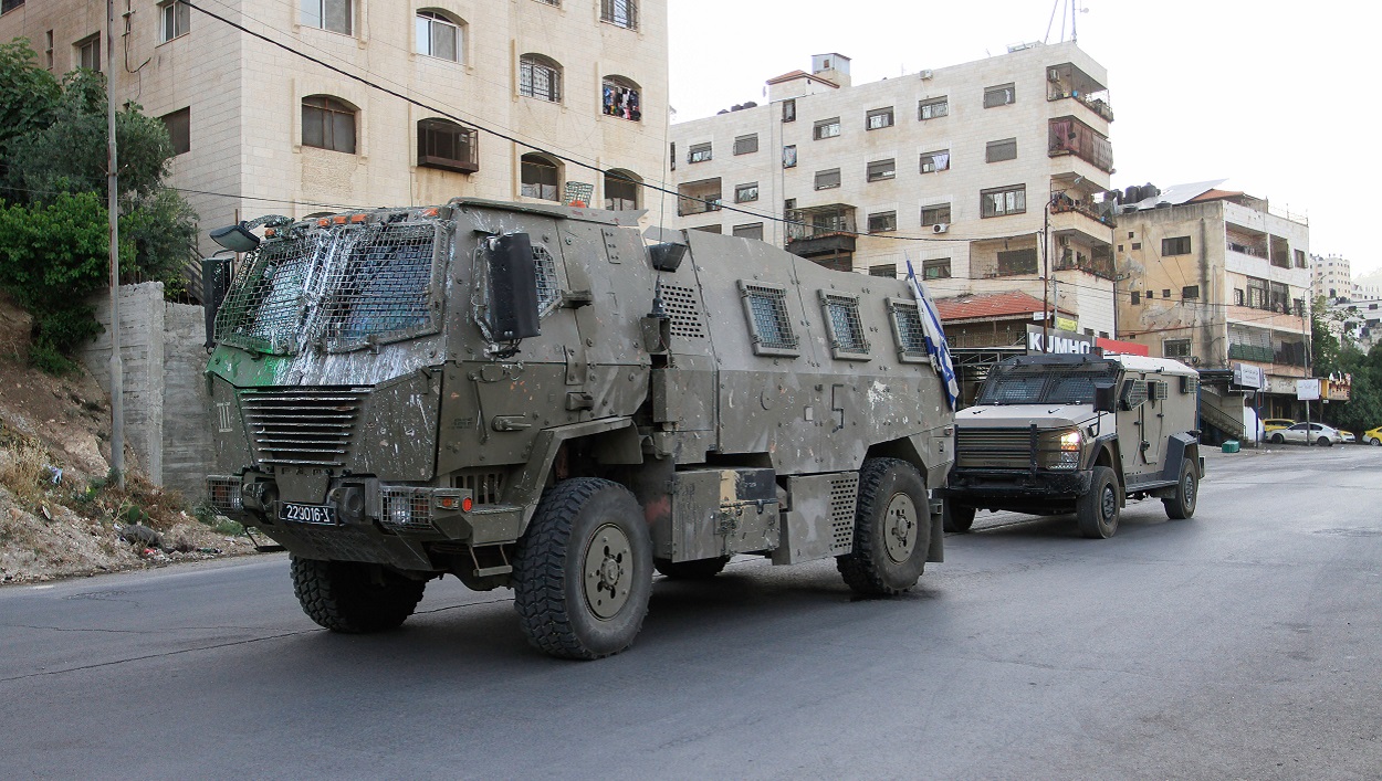 Imagen de archivo carros militares. EP