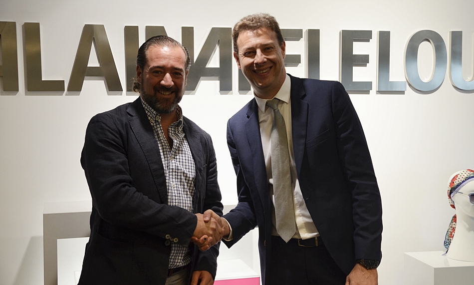 Frédéric Poux, presidente del Grupo Alain Afflelou, (dcha.) y Francisco Ortega, fundador de Audicost, (izda.) tras la presentación del acuerdo. 