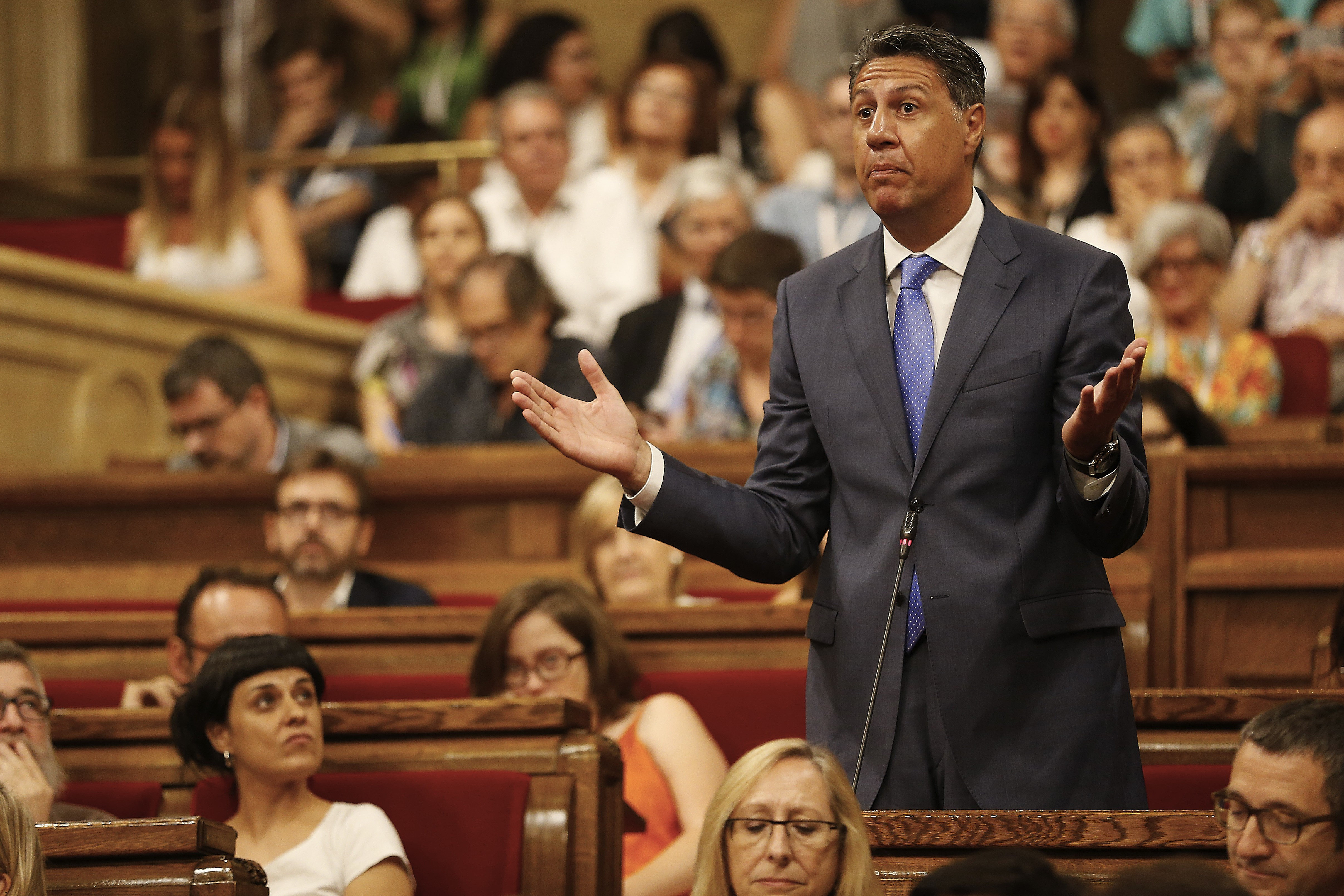 Xavier García Albiol, portavoz del PP en el Parlament, en un momento del bronco debate. EFE