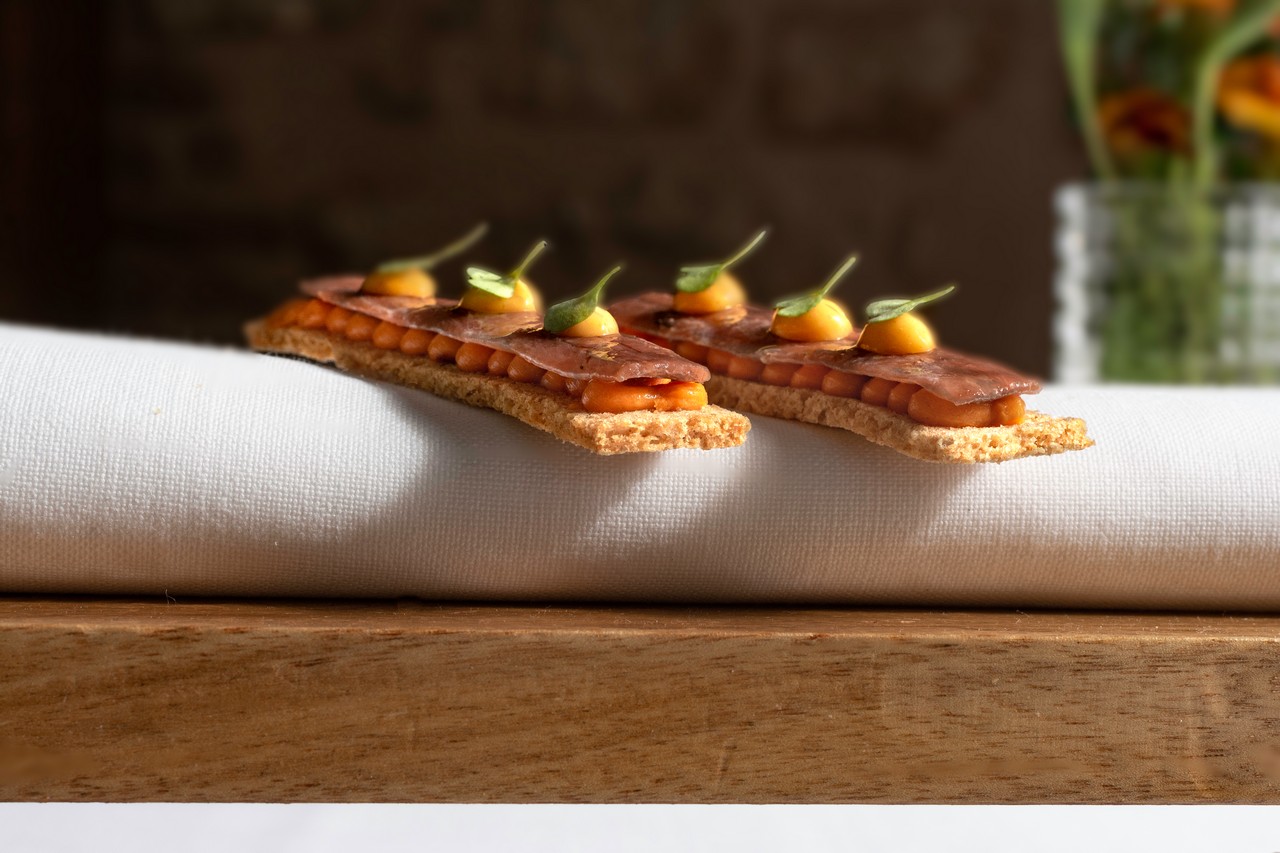 Aperitivo de perdigacho en pan brioche de espelta (Foto: restaurante Molino de Alcuneza)