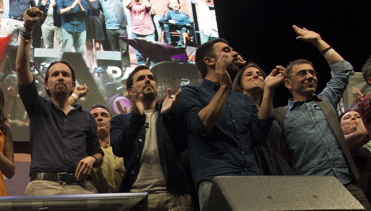 Pablo Iglesias, Alberto Garzón, Ramón Espinar y Juan Carlos Monedero durante un acto de campaña en Madrid