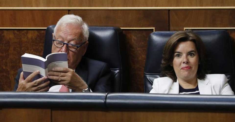 Imagen de archivo de José Manuel García Margallo y Soraya Sáenz de Santamaría en el Congreso. EFE
