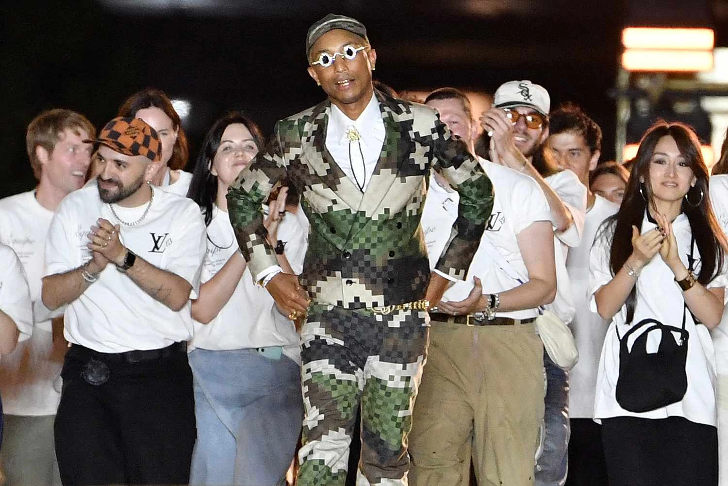 pharrell-williams-lv-show-062023-walking-d1e73d3922a04e9ea5bfc76c8861b7ed.webp