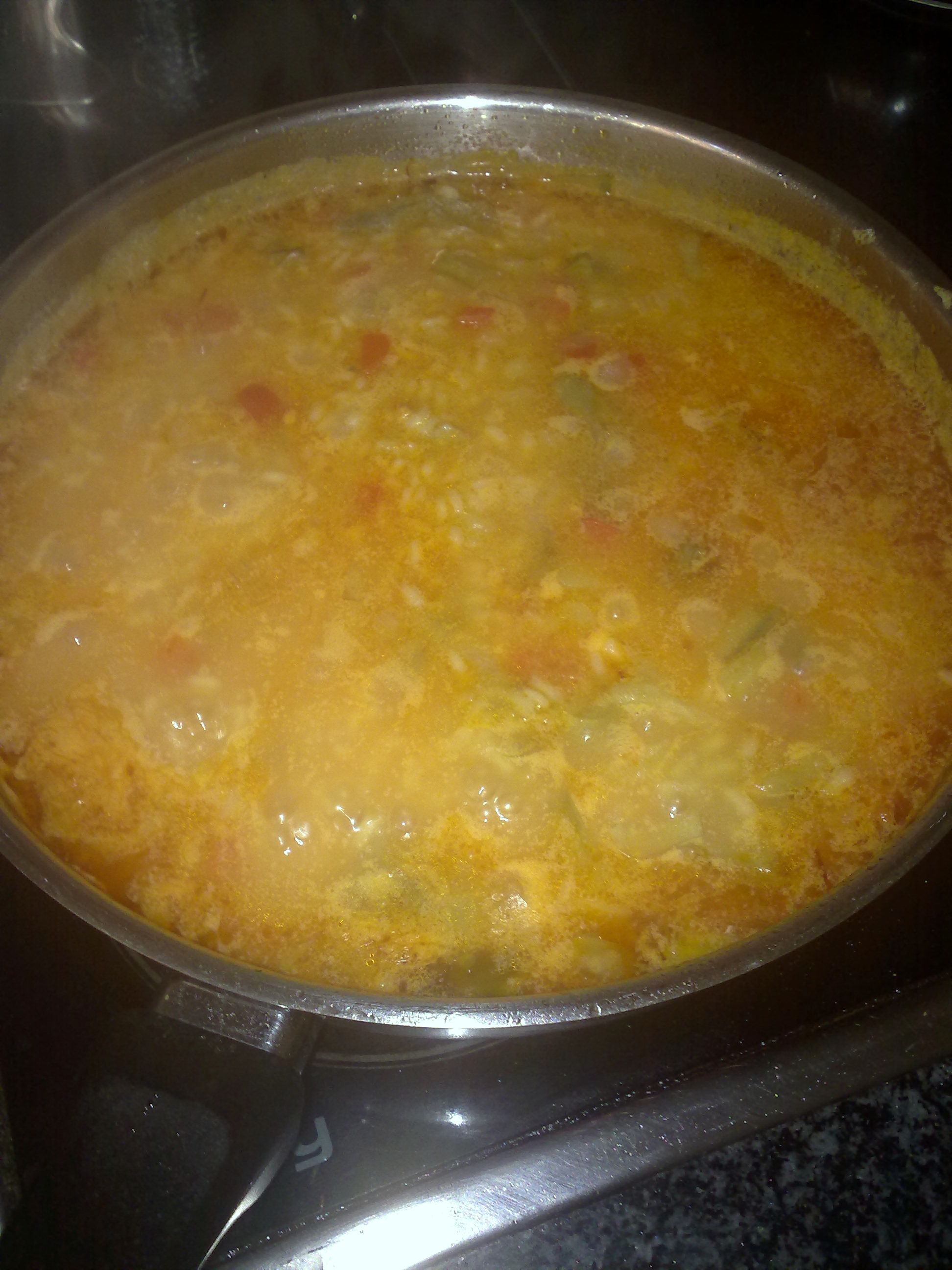 Arroz caldoso con verduras y ensalada mixta
