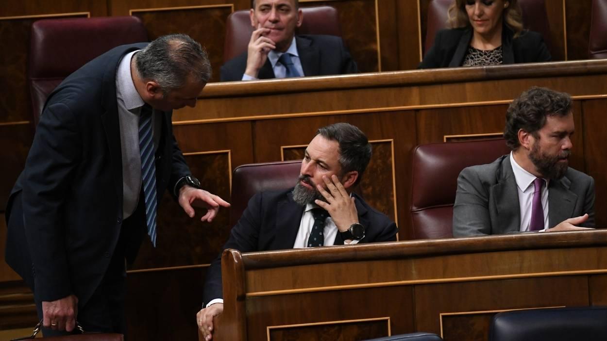 Javier Ortega-Smith, Santiago Abascal e Iván Espinosa de los Monteros, durante un pleno. EP/Archivo.