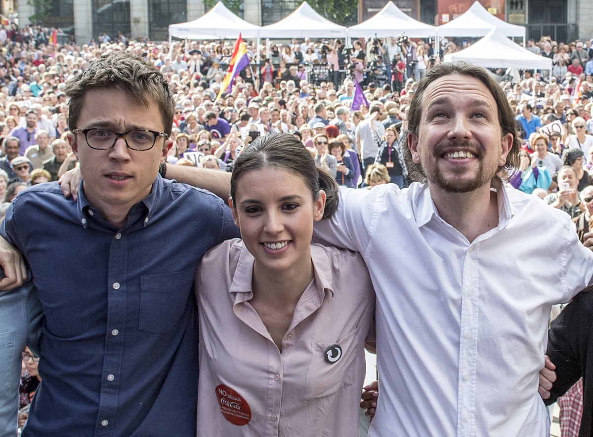 Íñigo Errejón, Irene Montero y Pablo Iglesias, en un acto de Podemos.