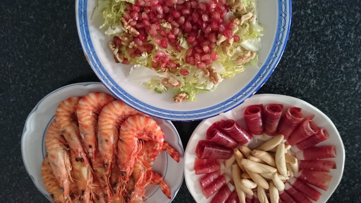 Aperitivos diversos y arroz caldoso con cola de langosta