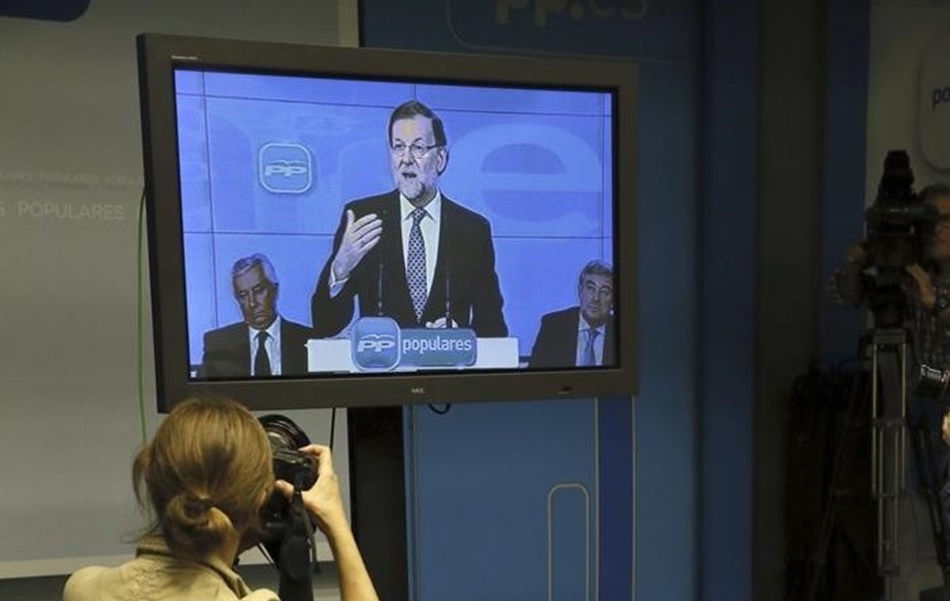 Rajoy, en una de sus intervenciones vía plasma.