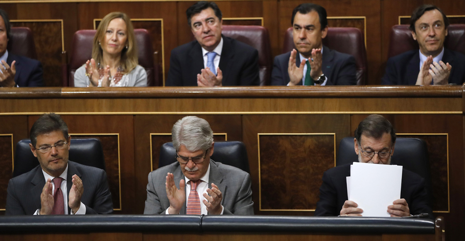 Mariano Rajoy, junto a los ministros, de Justicia, Rafael Catalá, y de Asuntos Exteriores, Alfonso Dastis, durante una sesión de control al Gobierno 