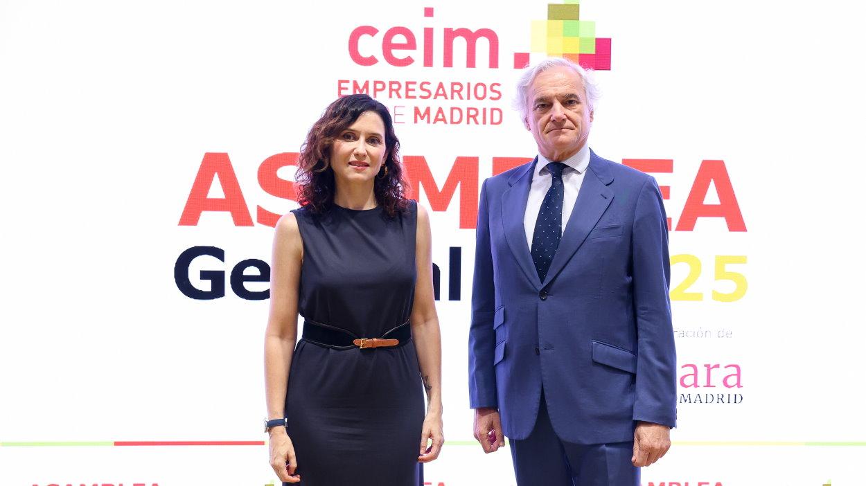 La presidenta de la Comunidad de Madrid, Isabel Díaz Ayuso, y el presidente de CEIM, Miguel Garrido. EP.