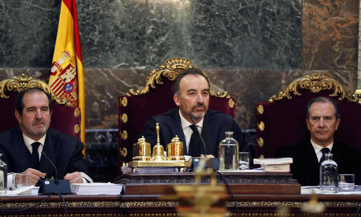 Manuel Marchena, junto a los también magistrados del Supremo Andrés Martinez Arrieta y Miguel Colmenero