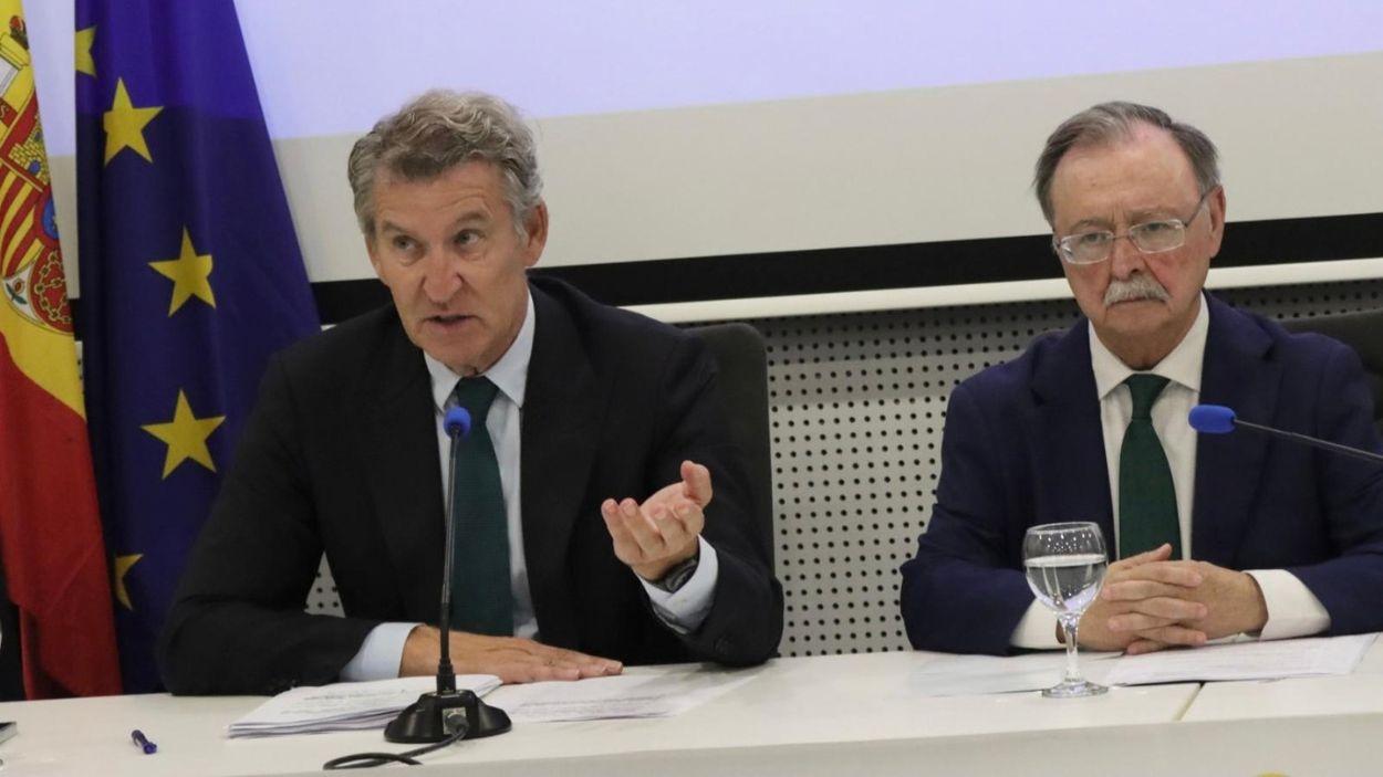El presidente del Partido Popular, Alberto Núñez Feijóo, y el presidente de la ciudad autónoma de Ceuta, Juan Jesús Vivas. EP.