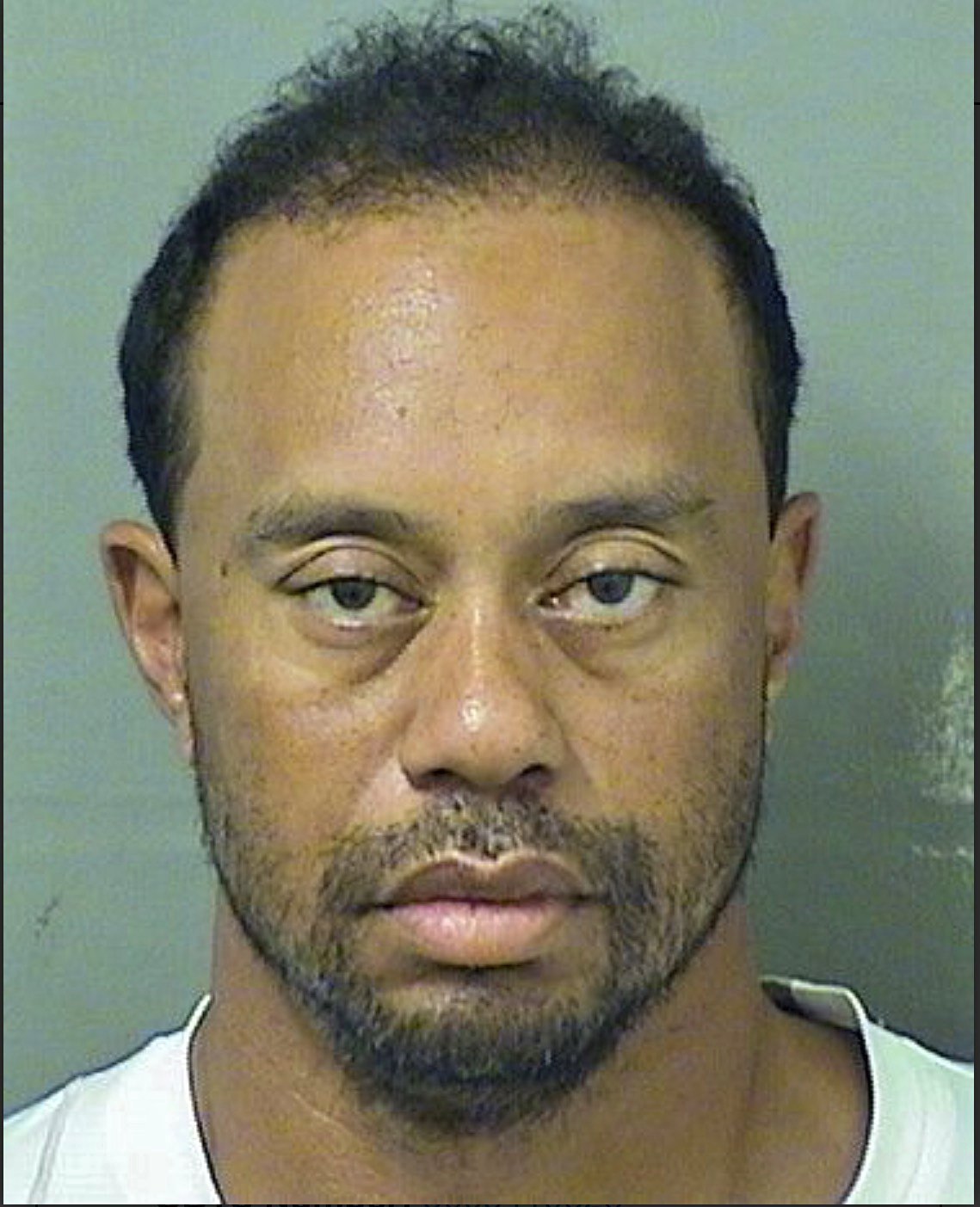 Foto cedida hoy por la oficina del alguacil del condado Palm Beach que muestra al golfista estadounidense Tiger Woods tras su arresto en Palm Beach, Florida, Estados Unidos