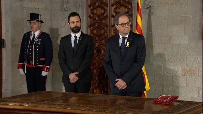 Toma posesión Quim Torra con Roger Torrent.