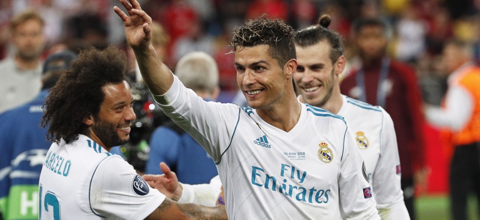 Real Madrid's Cristiano Ronaldo (C) celebrates after the UEFA Champions League final between Real Madrid and Liverpool FC at the NSC Olimpiyskiy stadium in Kiev, Ukraine