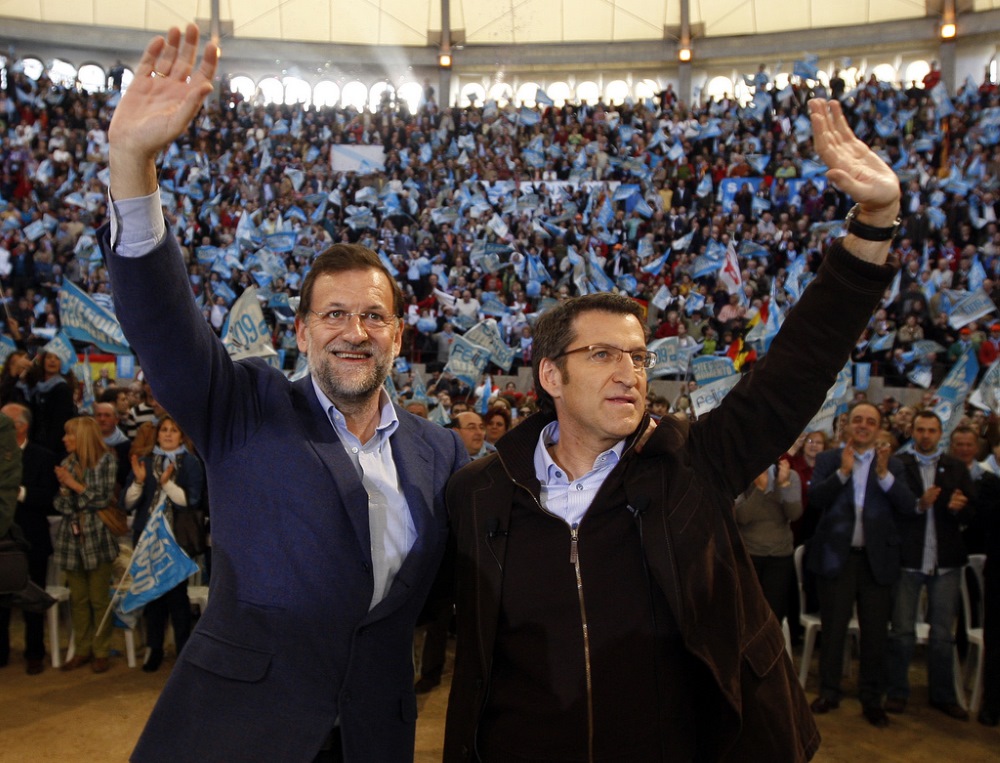 Mariano Rajoy y Alberto Núñez Feijóo en un acto del PP en 2009