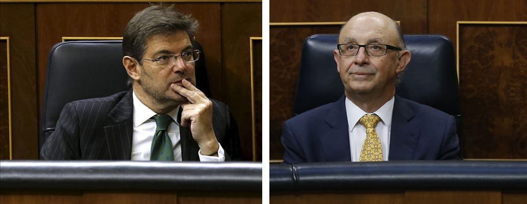 El ministro de Justicia Rafael Catalá y el ministro de Hacienda Cristóbal Montoro