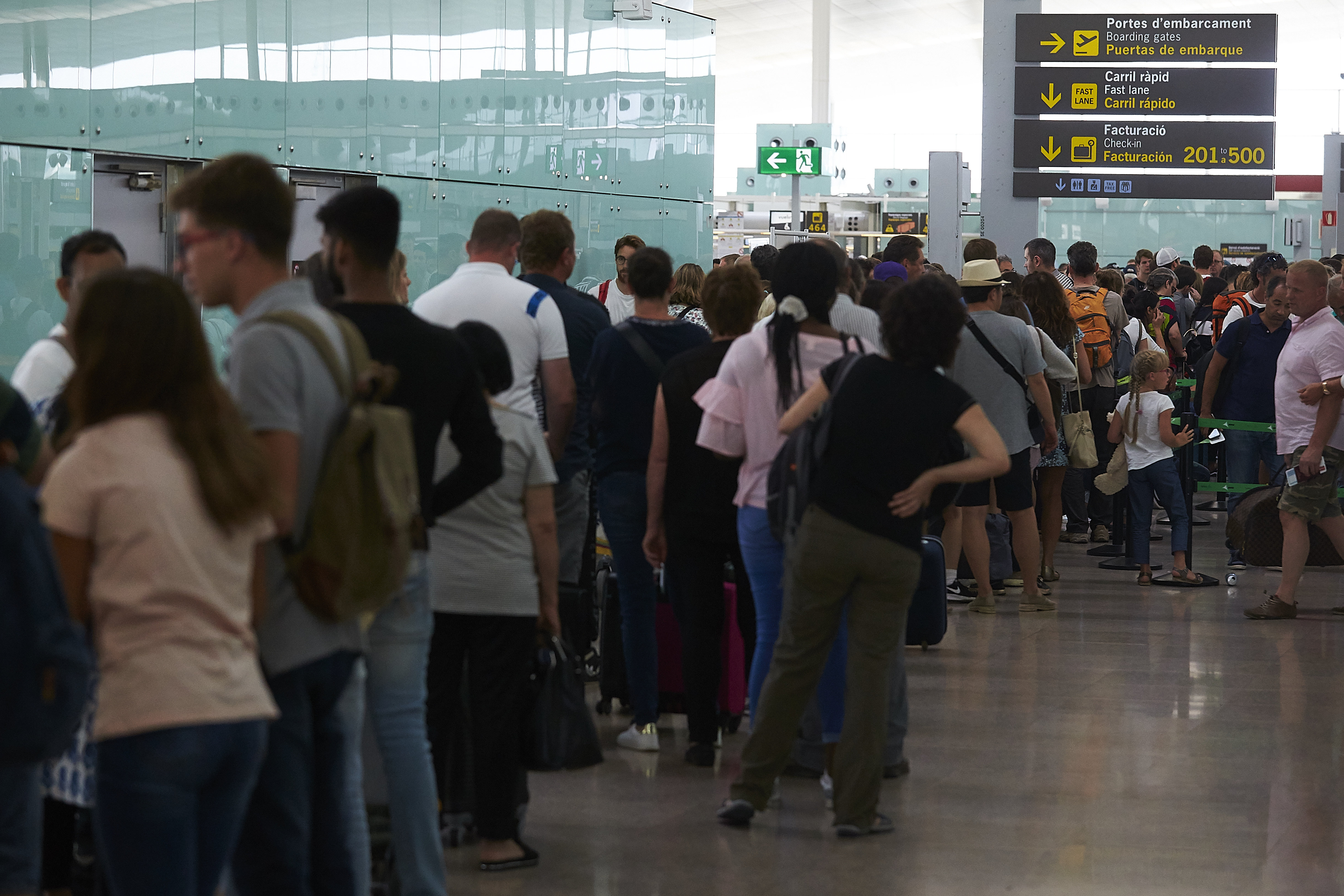Pasajeros esperando en el aeropuerto de El Prat