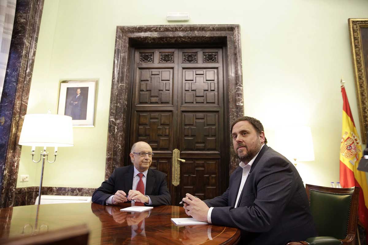 Cristóbal Montoro y Oriol Junqueras en una reunión hace más de un año