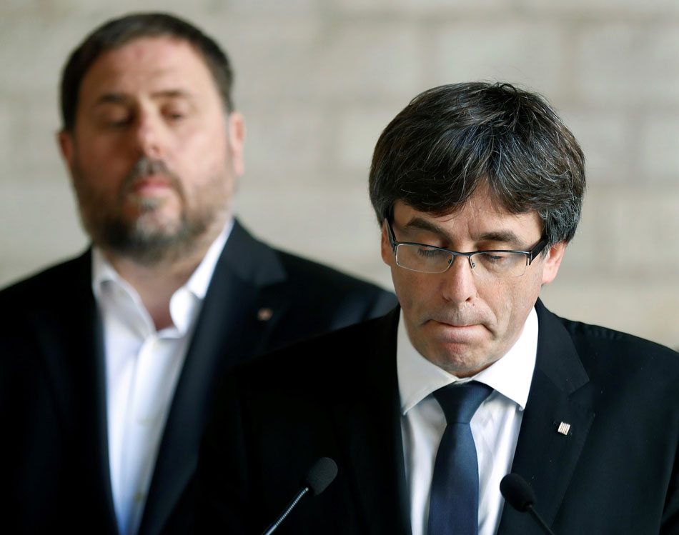 Oriol Junqueras y Carles Puigdemont durante una comparecencia. 