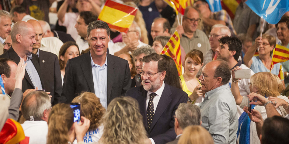 El presidente del Gobierno, Mariano Rajoy, junto al líder del PP catalán, Xavier García Albiol, en un acto de 2015
