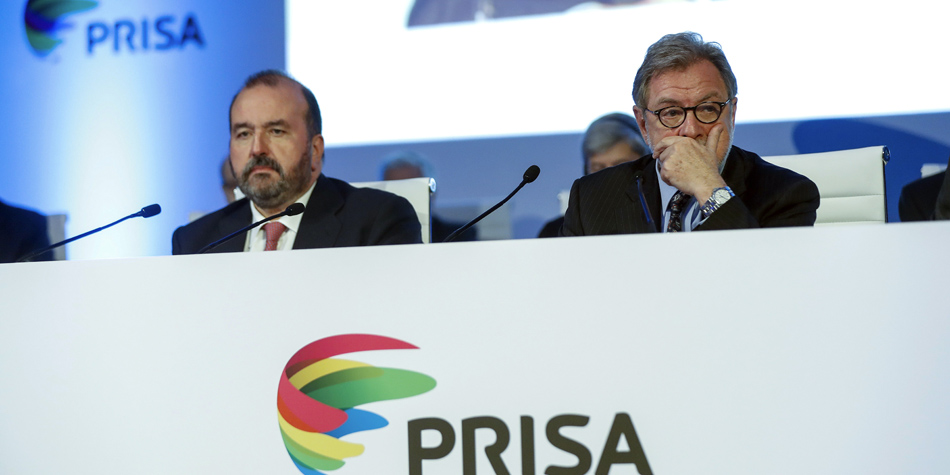 El presidente y el consejero delegado de Prisa, Juan Luis Cebrián y José Luis Sainz, respectivamente, durante la última junta general de accionistas