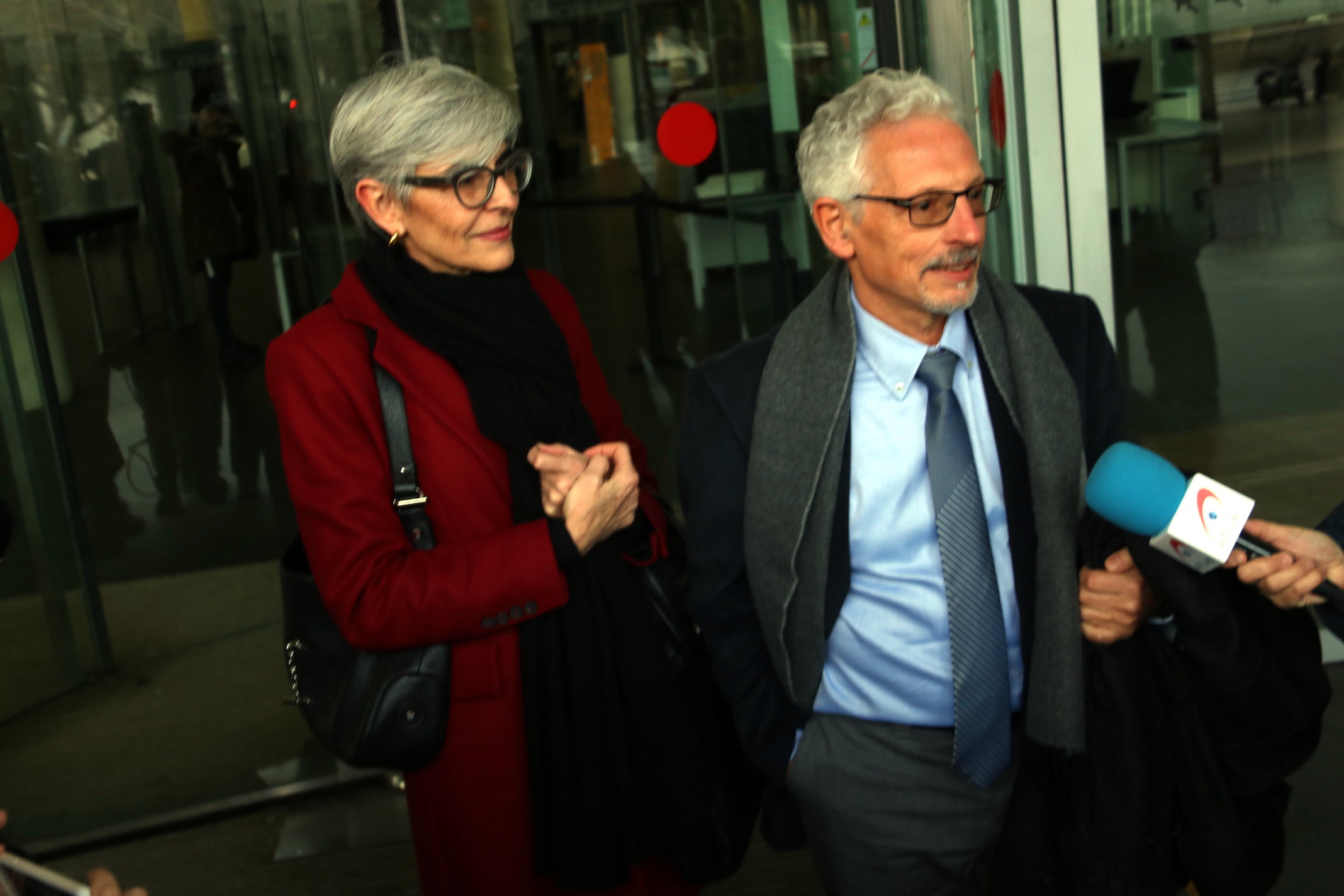 Santi Vidal i la seva advocada Olga Tubau sortint dels jutjats de Barcelona després de declarar per l'organització de l'1-O