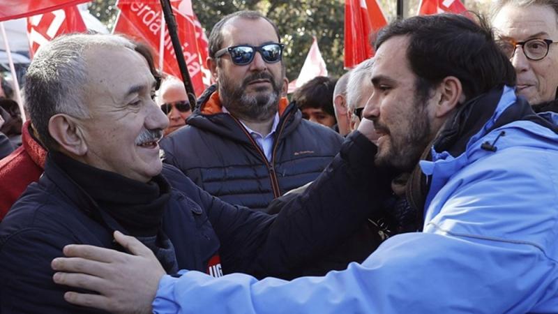 El secretario general de UGT, Pepe Álvarez, y el coordinador general de IU, Alberto Garzón, durante la manifestación del 18D por los derechos laborales.