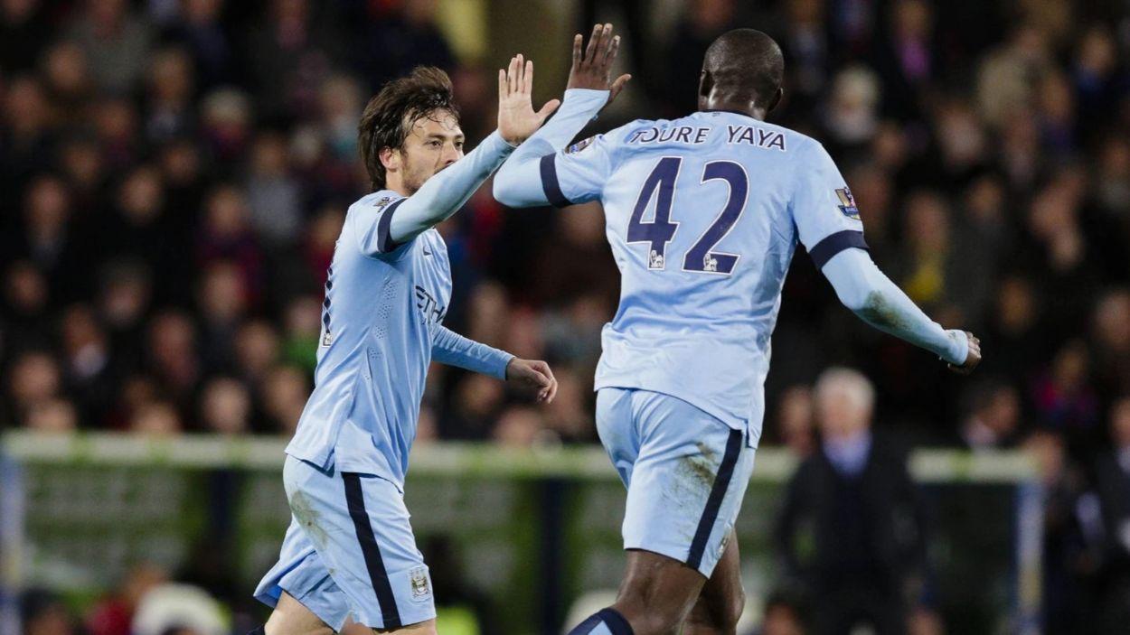 David Silva y Yaya Touré durante un encuentro con el Manchester City. Archivo.