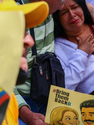 Simpatizantes del régimen de Nicolás Maduro en una manifestación contra su detención judicial. EP.