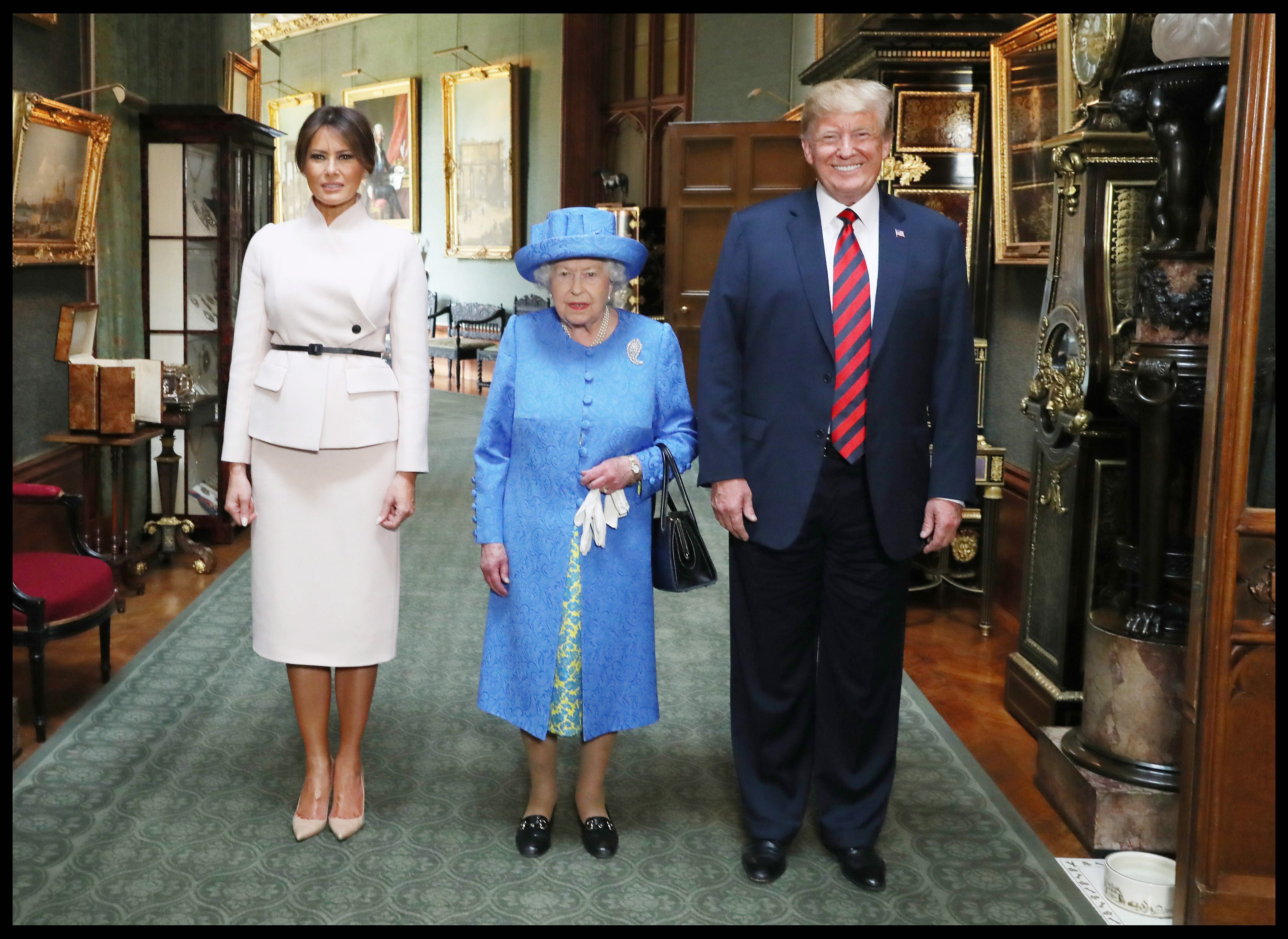 Donald Trmp y Melania durante la recepción con Isabel II