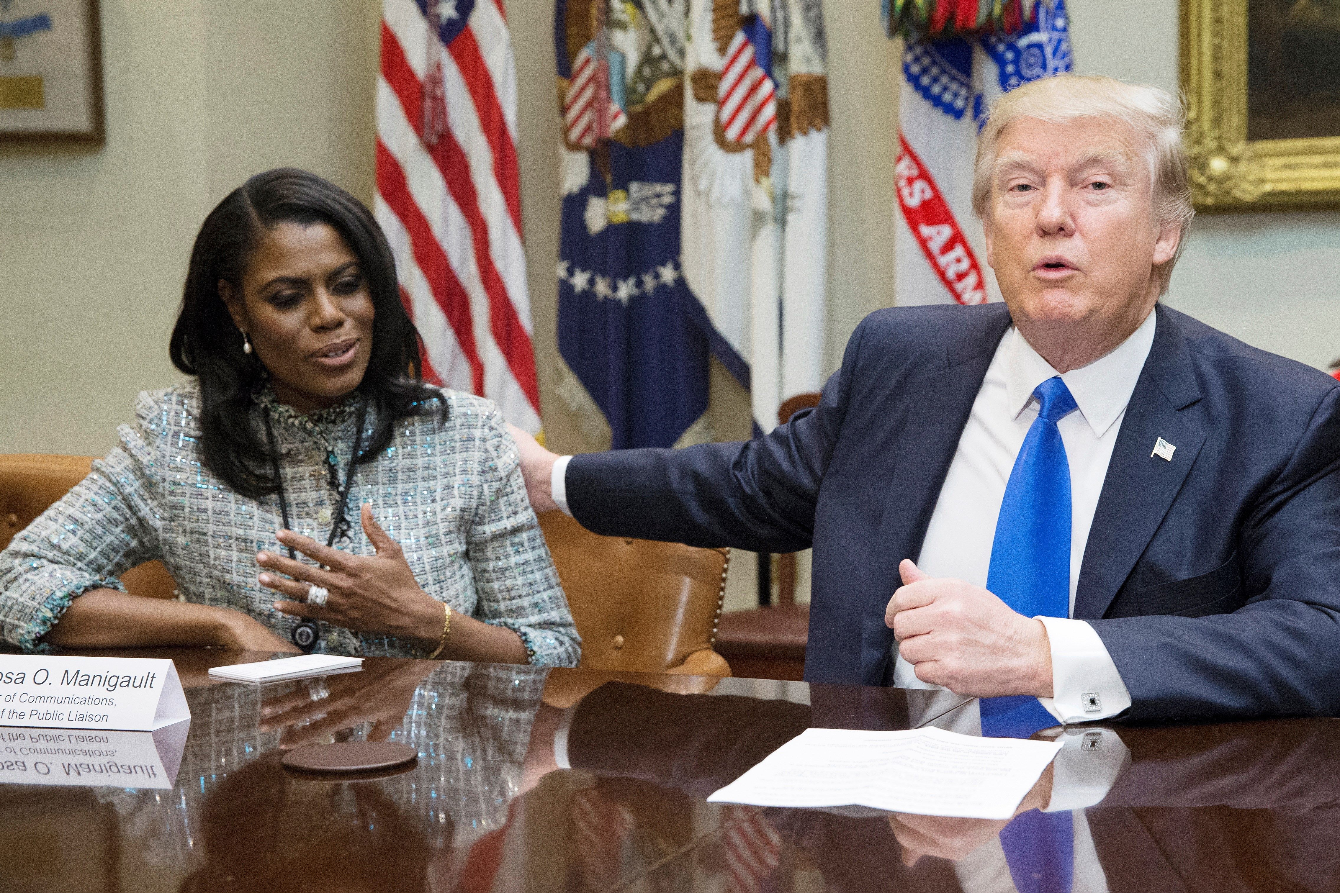 Donald Trump junto a Omarosa Manigault Newman