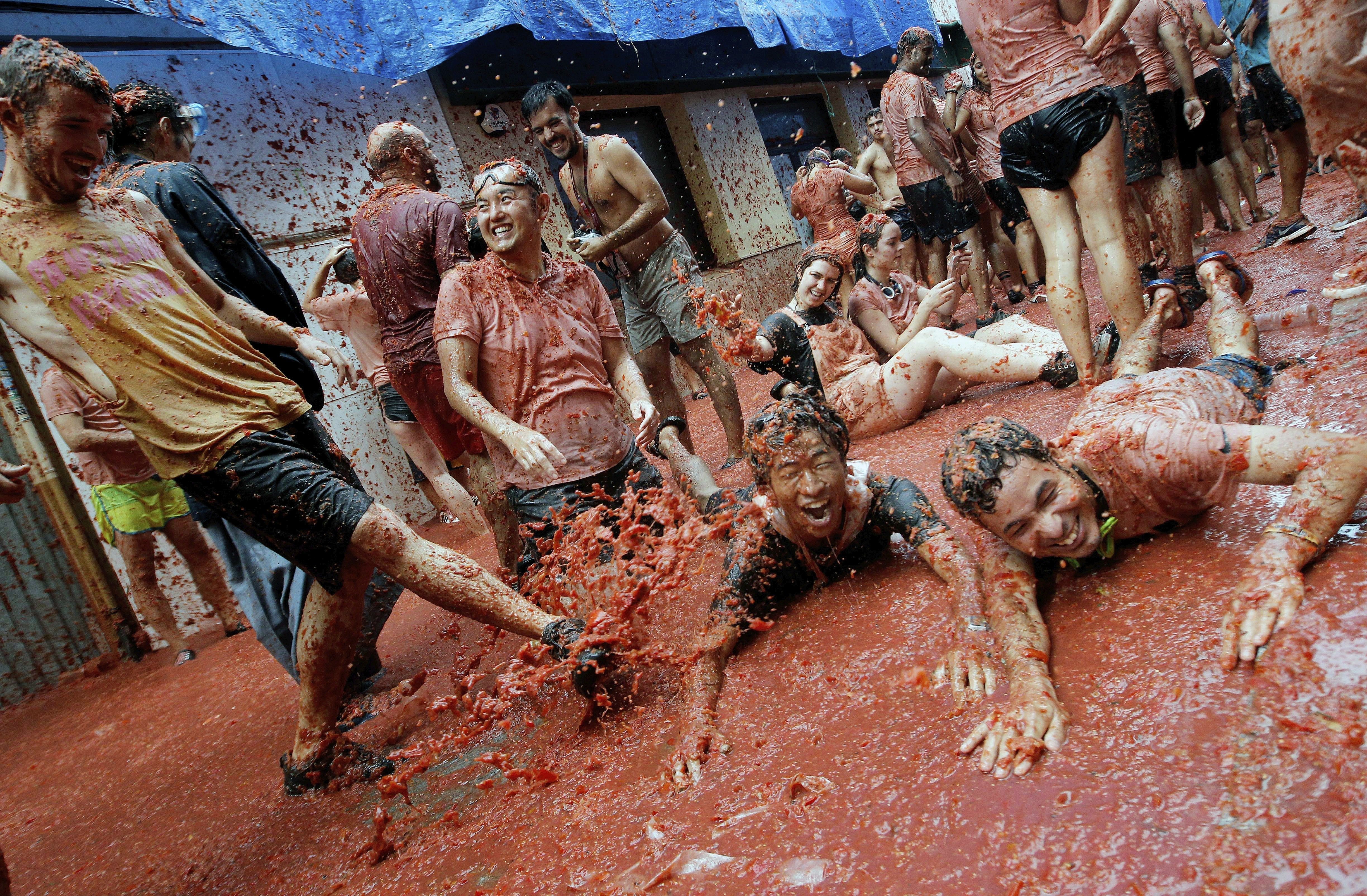 Participantes en la fiesta de La Tomatina: Fuente EFE/Archivo